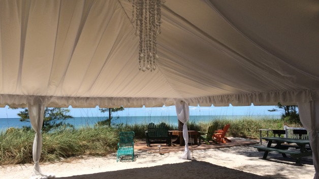 inside a beach wedding tent