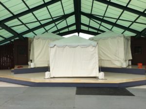 small tents on a stage