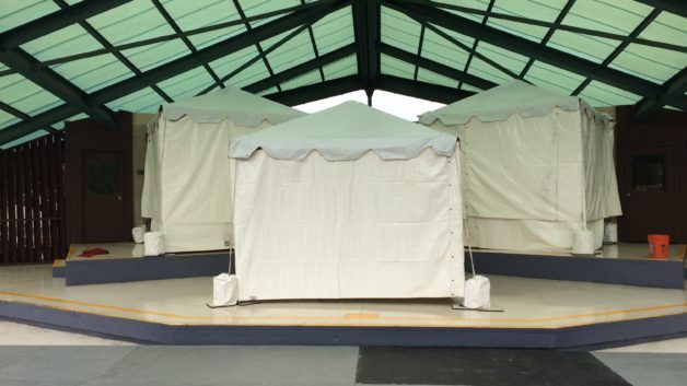 small tents on a stage
